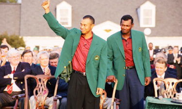 Pictured are Tiger Woods (L) and Vijay Singh during the presentation ceremony of the 2001 Masters tournament in Augusta