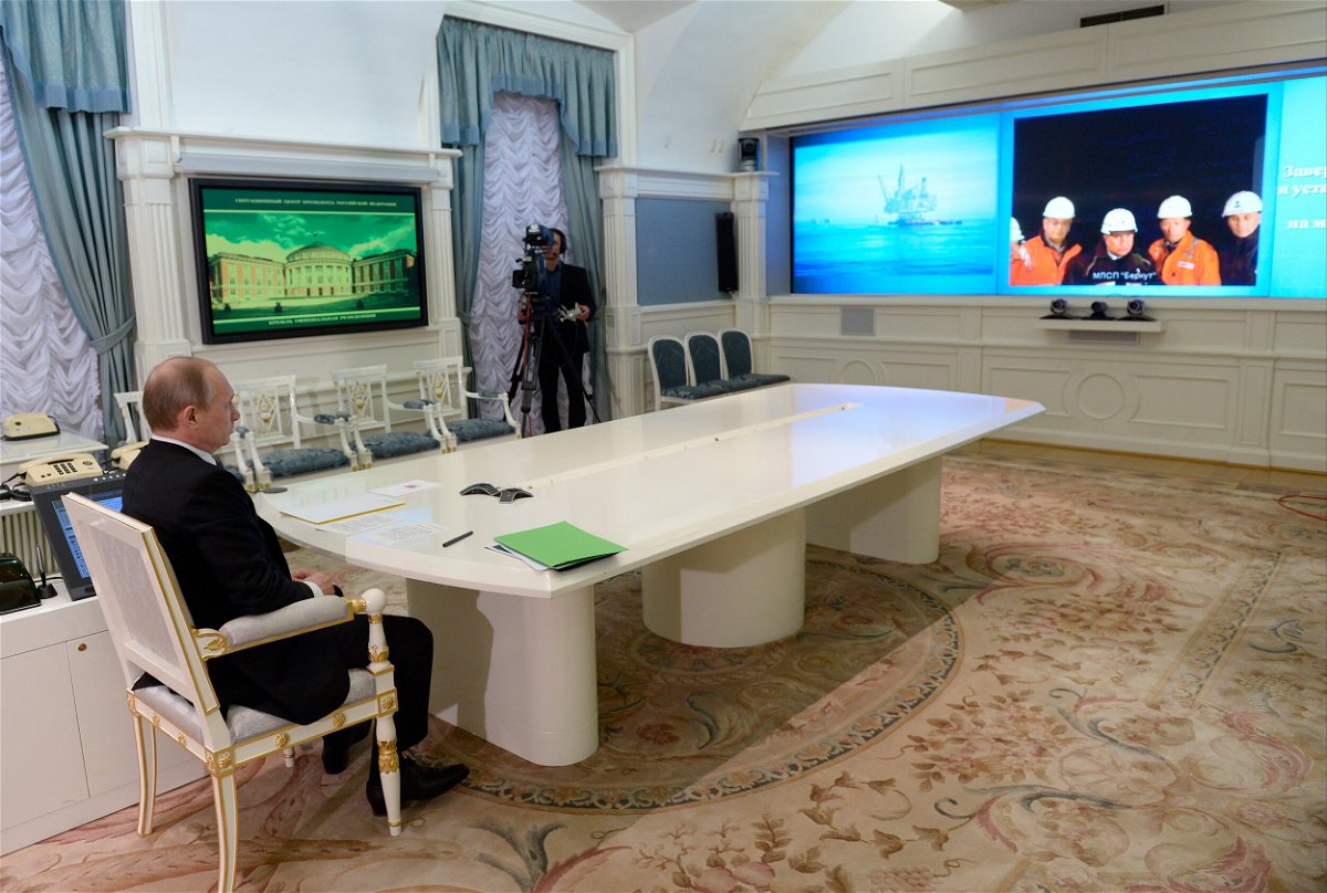 <i>Alexei Nikolsky/AP/FILE</i><br/>Russian President Vladimir Putin has a video conference with the Berkut offshore drilling platform launched in the Sea of Okhotsk as part of the Sakhalin-1 oil and gas project
