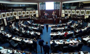 Florida state representatives work in the House during a legislative session at the state Capitol in Tallahassee