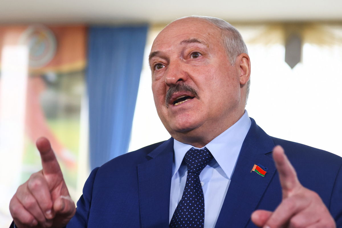 <i>Peter Kovalev/TASS/Getty Images</i><br/>Belarusian President Alexander Lukashenko talks to reporters in the 2022 Belarusian constitutional referendum in Minsk