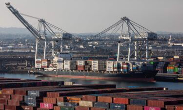 Shipping containers on the Matson Molokai cargo ship are seen at the Port of Long Beach in Long Beach