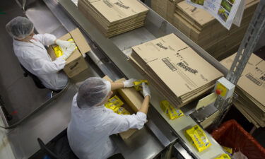 Workers pack boxes with packets of Nesquik in Samara