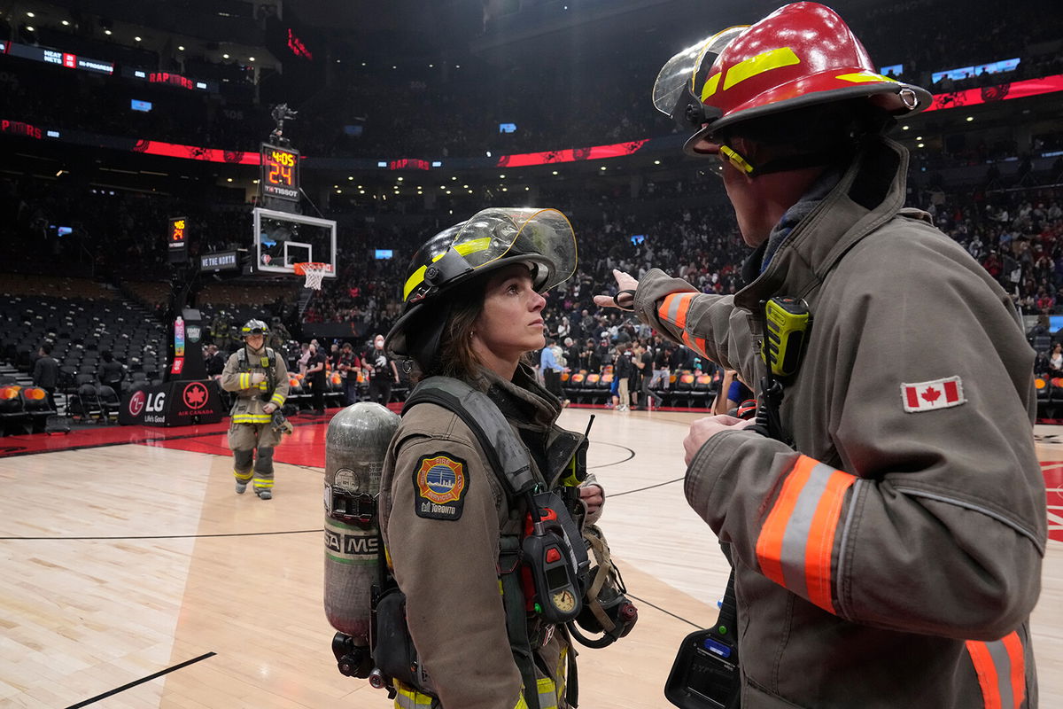 <i>Frank Gunn/AP</i><br/>The NBA game between the Toronto Raptors and the Indiana Pacers was suspended as firefighters worked to evacuate the building.