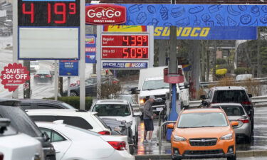 People pump gas at a Giant Eagle GetGo where a gallon of unleaded regular gas is $4.19.9