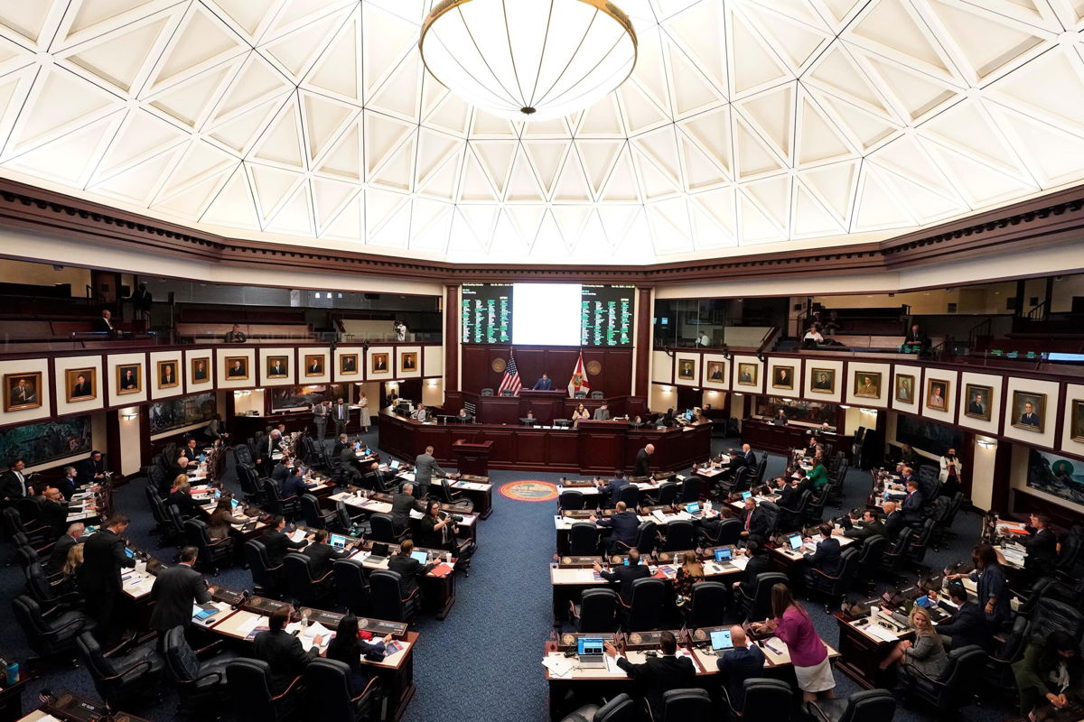 <i>Wilfredo Lee/AP</i><br/>The Republican-controlled Florida House on Wednesday night passed a voting overhaul bill that would create a new security office to investigate election crimes and increase penalties for violating the state's elections laws. Members of the Florida House of Representatives are shown here during a legislative session at the Florida State Capitol