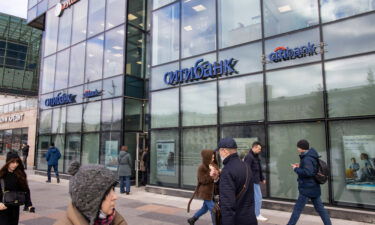 Banks scramble to figure out how much they'll lose if Russia's economy implodes. Pictured is Citibank in Moscow