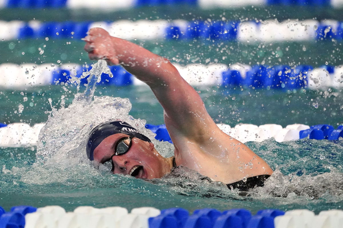 <i>John Bazemore/AP</i><br/>Lia Thomas competes in the 500-yard freestyle finals at the NCAA Swimming and Diving Championships