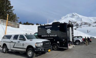 Rescuers worked in challenging conditions to reach the climbers who fell about 200 feet on Mount Hood Sunday.