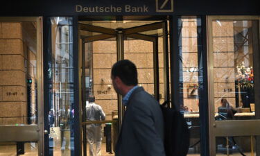 A man is seen outside the US headquarters of Deutsche Bank on July 8