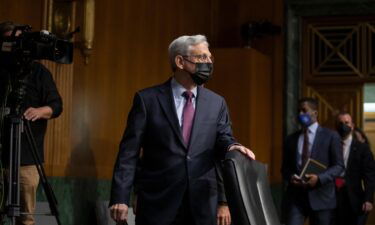 US Attorney General Merrick Garland walks into the hearing room ahead of a Senate Judiciary Committee hearing on October 27