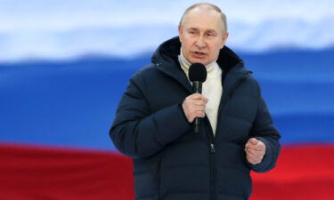 Russian President Vladimir Putin speaks during a concert in Moscow on March 18 to mark the anniversary of the annexation of Crimea. US and NATO officials believe Putin has not backed off his original demands in talks with Ukraine