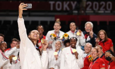 Brittney Griner #15 of Team United States takes a selfie with her teammates and their gold medals during the Women's Basketball medal ceremony on day sixteen of the 2020 Tokyo Olympic games at Saitama Super Arena on August 08