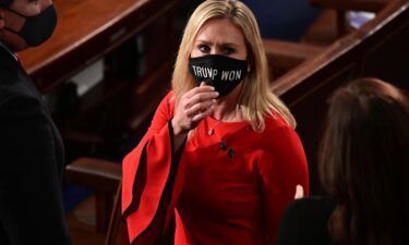 US Rep. Marjorie Taylor Greene (R-GA) wears a "Trump Won" face mask on January 3