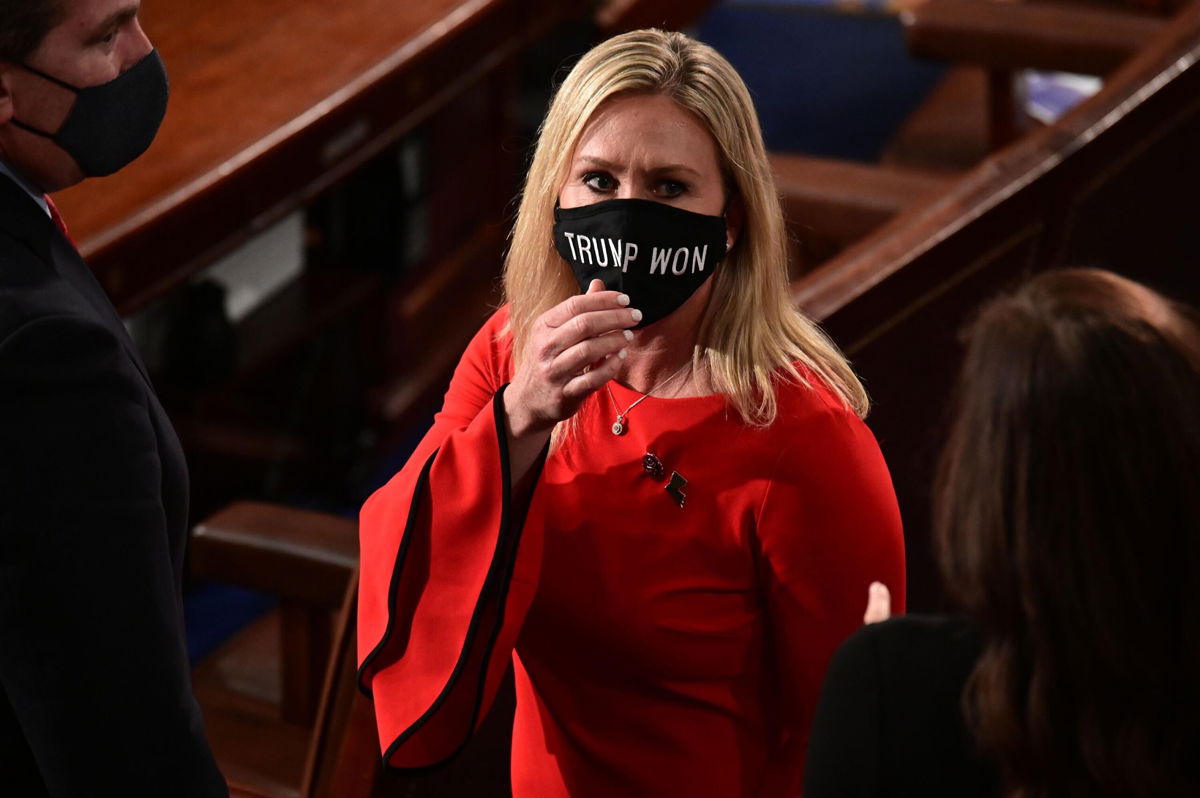 <i>ERIN SCOTT/AFP/POOL/Getty Images</i><br/>US Rep. Marjorie Taylor Greene (R-GA) wears a 