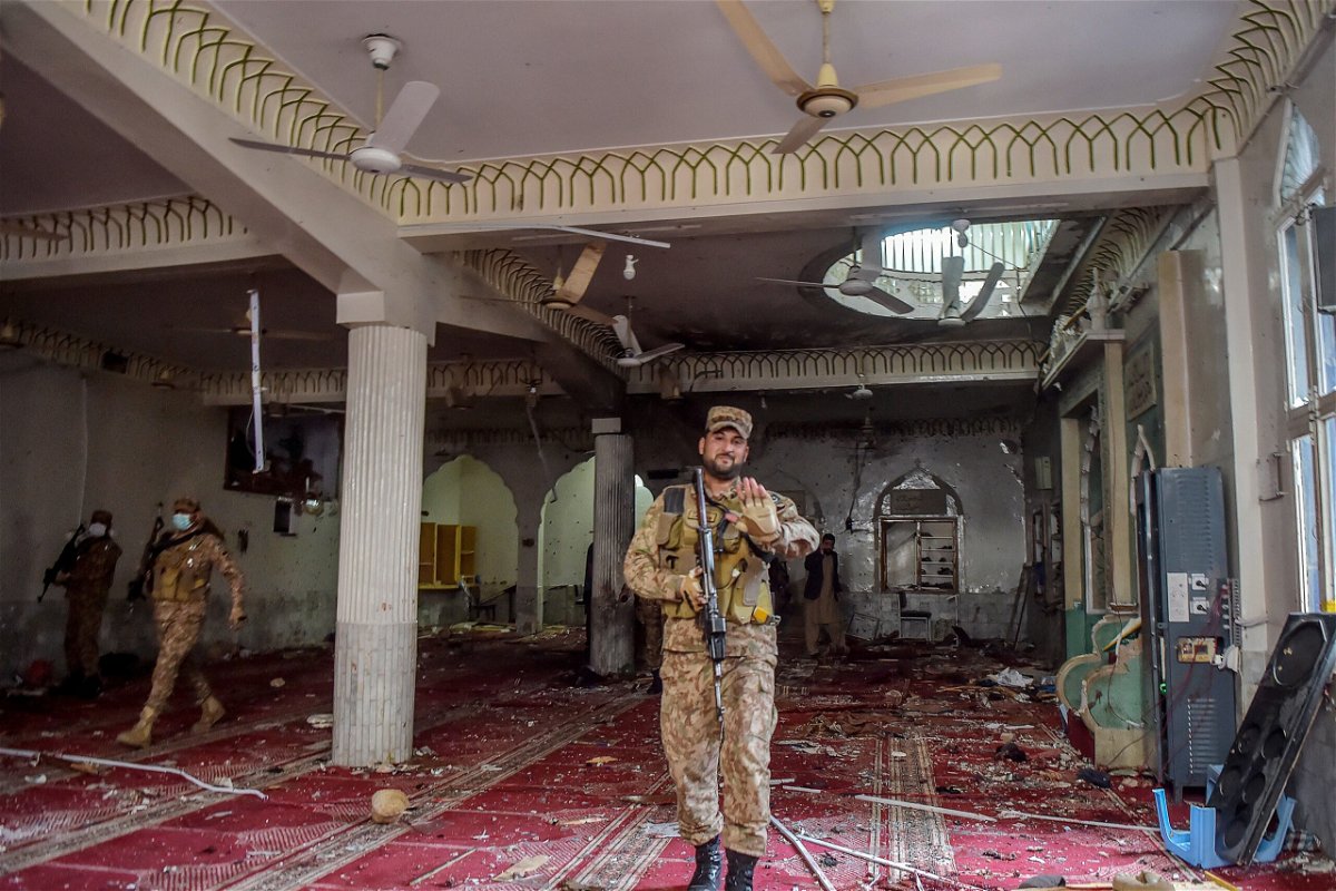 <i>ABDUL MAJEED/AFP/Getty Images</i><br/>Soldiers inspect a mosque after the explosion.