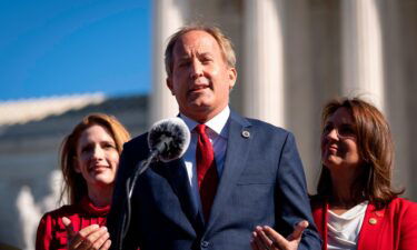 Texas Attorney General Ken Paxton announced Wednesday he is suing the Biden administration over guidance from federal health officials that conflicts with his legal opinion that gender affirming procedures in children should be considered "child abuse." Paxton is shown here outside the Supreme Court in Washington