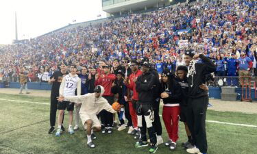 The Kansas Jayhawks were greeted by fans at the David Booth Kansas Memorial Stadium on April 5 after returning to Lawrence.