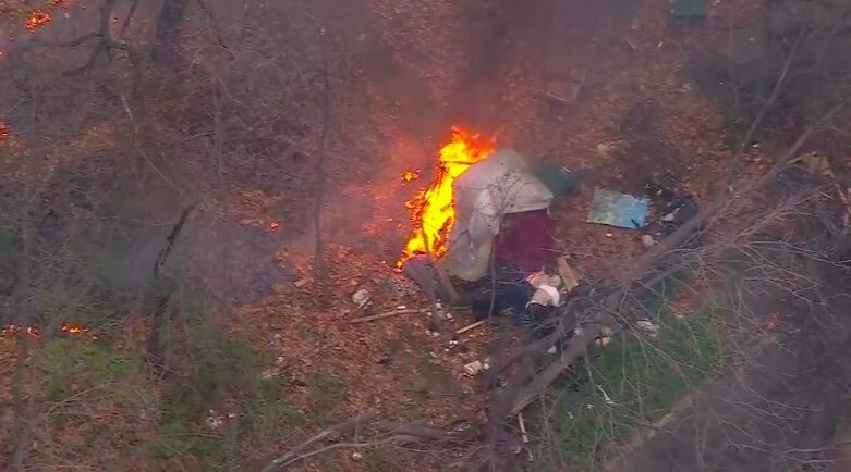 <i>WABC</i><br/>Two men jumped out of a burning tent during a brush fire in Washington Heights Tuesday morning.