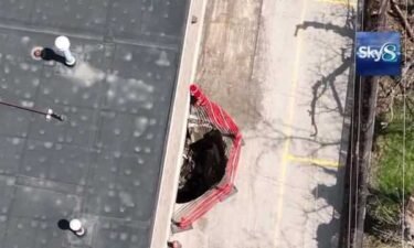 A large hole has opened up in the alley behind the Hy-Vee at the Uptown Shopping Center at 42nd Street and University. According to the property manager