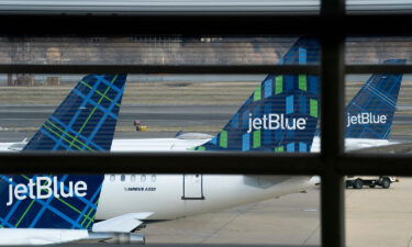 JetBlue planes sit at Ronald Reagan Washington National Airport in Arlington