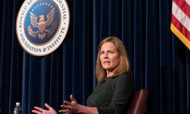Justice Amy Coney Barrett reflected on her own confirmation process Monday night hours after the Senate Judiciary Committee had voted along party lines
