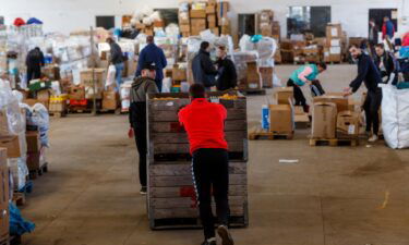 A file photo showing humanitarian workers in Ukraine in March. Aid groups helping Ukraine face both cyber and physical threats.