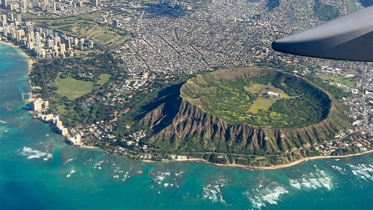 <i>Daniel Slim/AFP/Getty Imges</i><br/>An aerial view from the window of a plane shows Diamond Head crater in Oahu