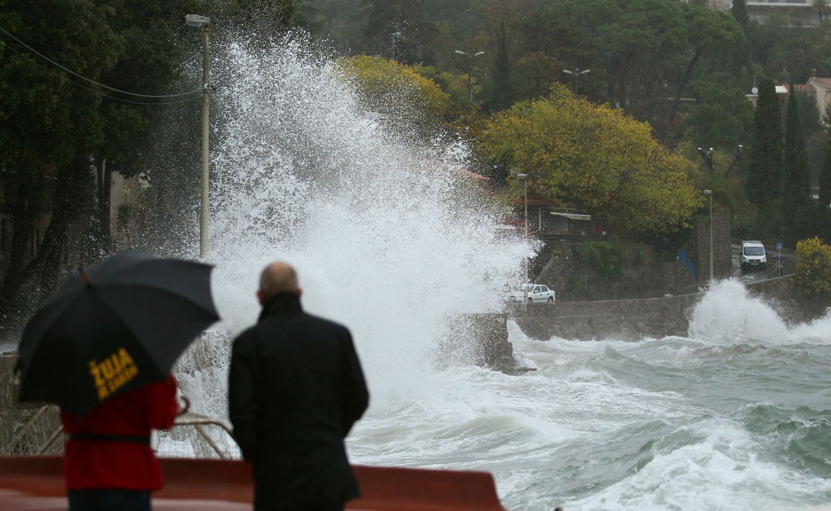 <i>Antonio Bronic/Reuters</i><br/>People watch the waves in Volosko