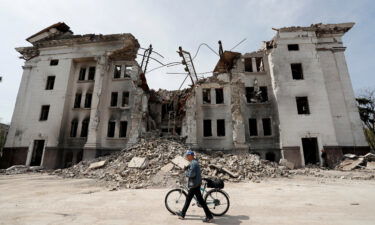 A theatre building is destroyed during the Ukraine-Russia conflict in the southern port city of Mariupol