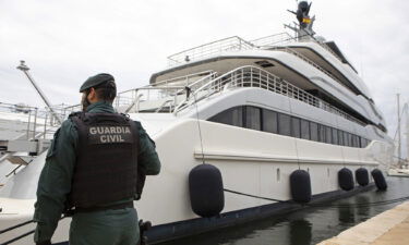 A Civil Guard stands by Russian billionaire Viktor Vekeselberg's yacht in Palma de Mallorca