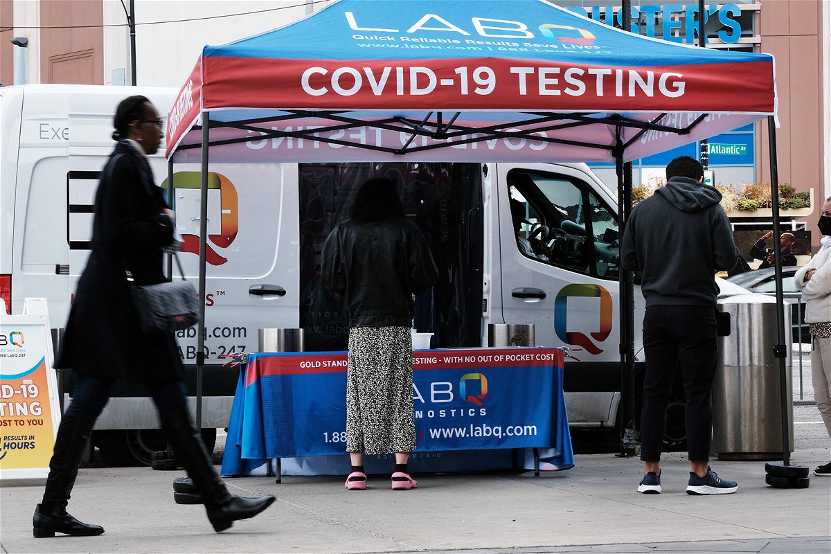 <i>Spencer Platt/Getty Images</i><br/>A Covid-19 testing site stands on a Brooklyn street corner in New York. Many states are scaling back on how often they report key Covid-19 statistics.