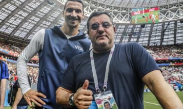 Raiola poses alongside Zlatan Ibrahimovic during the 2018 FIFA World Cup in Russia.