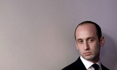 Senior adviser to then-President Donald Trump Stephen Miller watches as then-Attorney General Jeff Sessions delivers remarks during the daily White House press briefing in March 2017 in Washington