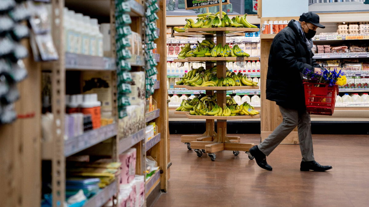 <i>Stefani Reynolds/AFP/Getty Images</i><br/>A shopper walks through a grocery store in Washington