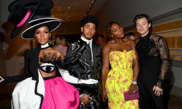 Serena Williams (2nd from right) and Lewis Hamilton (3rd from right) have joined former Liverpool chairman Martin Broughton's bid to buy Chelsea.