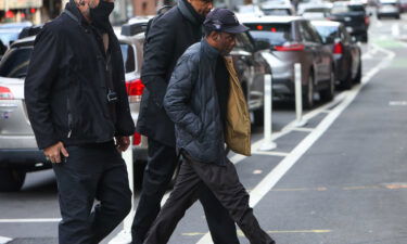 Chris Rock enters the Wilbur Theater in Boston for the first of his two sold-out performances on March 30. Three days earlier