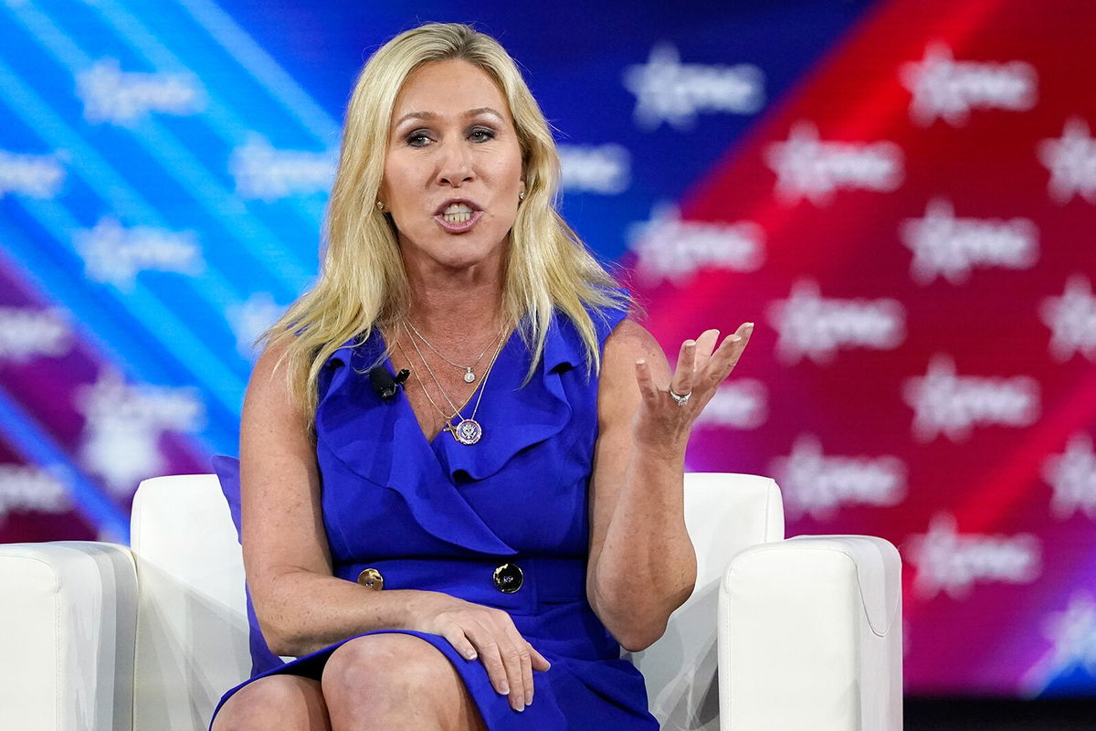 <i>John Raoux/AP/FILE</i><br/>Rep. Marjorie Taylor Greene answers questions during a panel discussion at the Conservative Political Action Conference on February 26