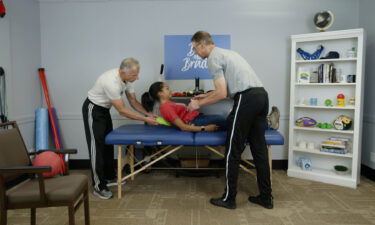 CNN's Channon Hodge says the two physical therapists helped ease her back pain with exercises and invaluable advice.