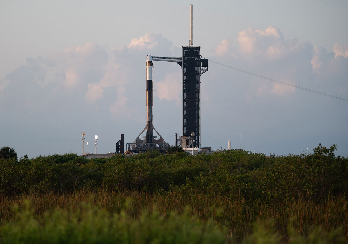 <i>Joel Kowsky/NASA</i><br/>A SpaceX Falcon 9 rocket with the company's Crew Dragon spacecraft is seen at sunrise on the launch pad at Launch Complex 39A as preparations continue for Axiom Mission 1