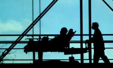 Hospital patients are seen being moved between wings at a New York hospital in February