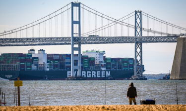 Evergreen Marine's Ever Forward container ship passes under the Chesapeake Bay Bridge after it was freed from mud outside the shipping channel off Pasadena