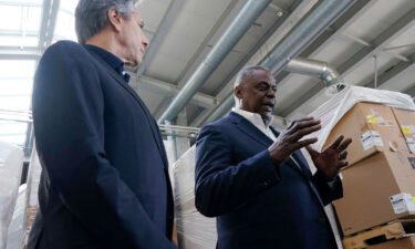 Secretary of Defense Lloyd Austin (R) and Secretary of State Antony Blinken (L) speak with reporters after returning from their trip to Kyiv