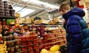 A person shops for groceries at Lincoln Market on March 10 in the Prospect Lefferts Garden neighborhood of Brooklyn borough in New York City.     New inflation data set to be released April 12 is expected to show that March marked yet another multi-decade inflation high.