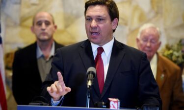 Gov. Ron DeSantis speaks a news conference in Fellsmere