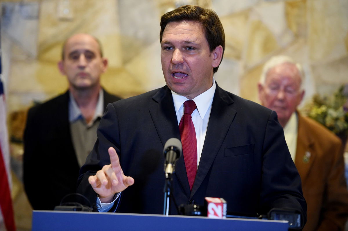 <i>Patrick Dove/TCPalm/USA Today Network</i><br/>Gov. Ron DeSantis speaks a news conference in Fellsmere