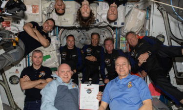 The 11-person crew aboard the International Space Station on April 9.