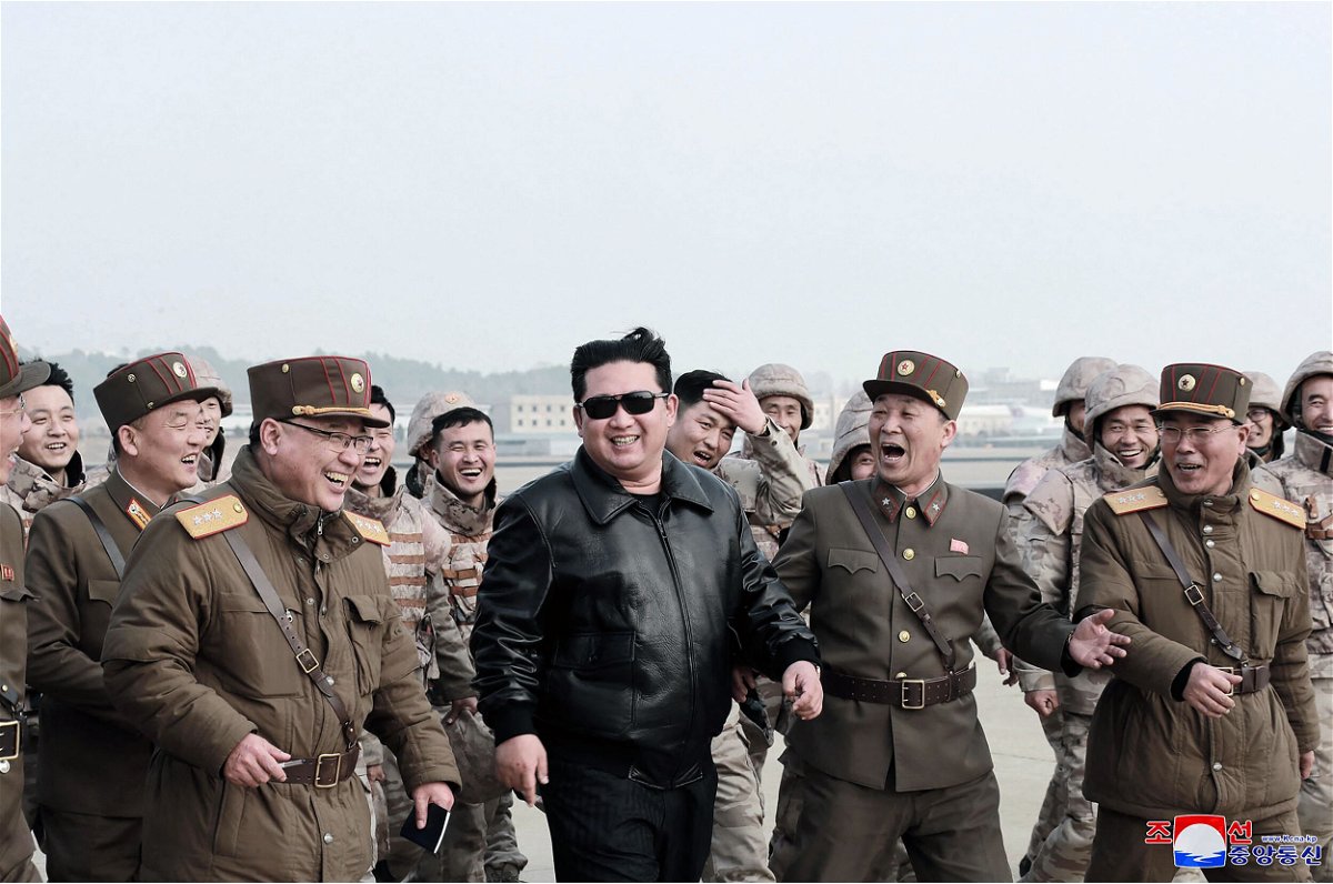 <i>KCNA VIA KNS/AFP/Getty Images</i><br/>North Korean leader Kim Jong Un (C) walks with North Korean military personnel during the test launch operation of what state media reports is a new type of intercontinental ballistic missile
