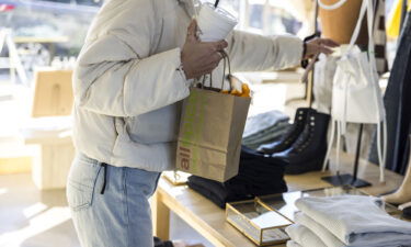 A shopper inside a women's clothing store in the East Village neighborhood of Des Moines