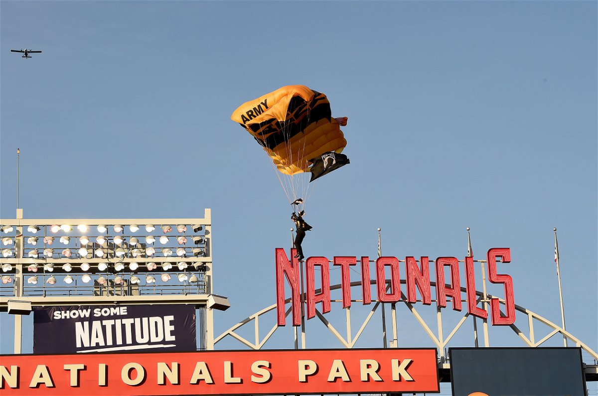 <i>Greg Fiume/Getty Images</i><br/>A member of the US Army Parachute Team The Golden Knights lands at Nationals Park before the game between the Washington Nationals and the Arizona Diamondbacks on Wednesday