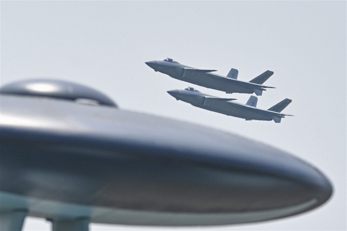 <i>hen Jimin/China News Service/Getty Images</i><br/>Two J-20 stealth fighter jets perform in the sky during an airshow in Zhuhai